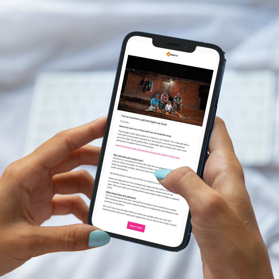 A SolarAid virtual gift is received on a phone