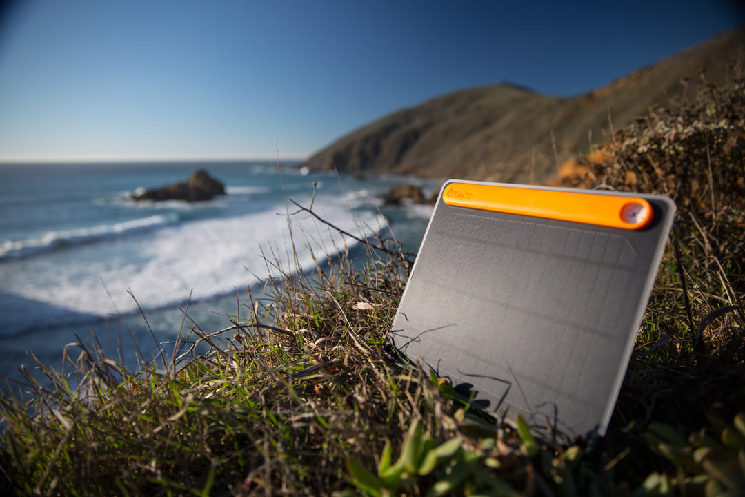 Biolite Solar Panel being charged by sunshine at the beach
